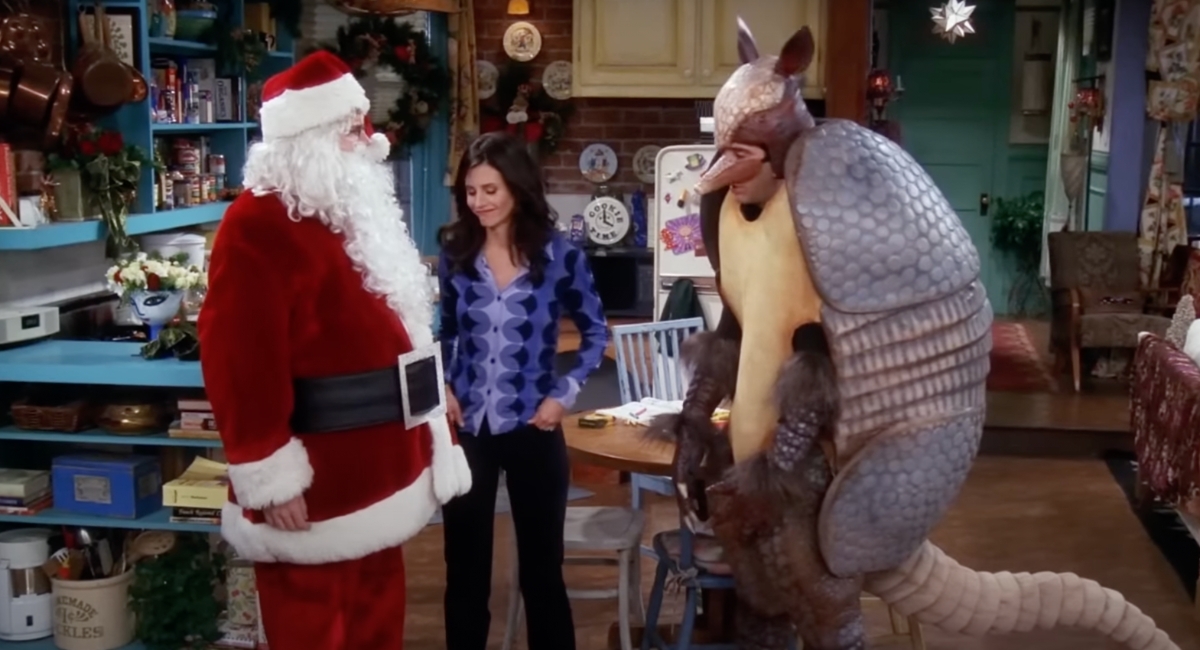 Ross dressed as Armadillo and Chandler dressed as Santa for holidays
