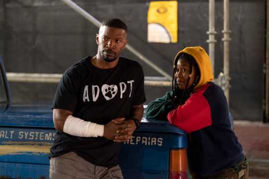 jamie foxx as art and dominique fishback as robin in project power