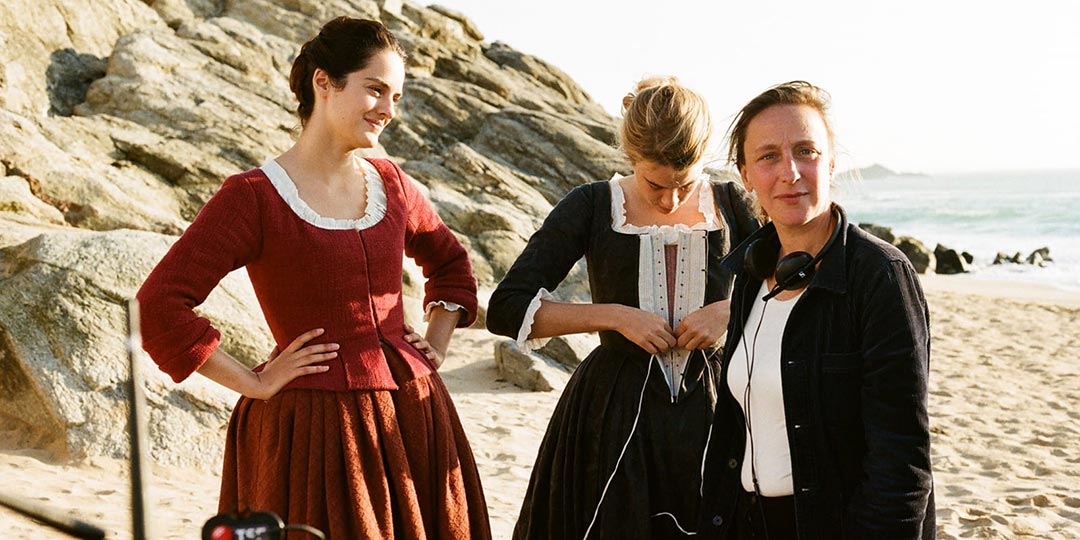 (L to R) Actors Noémie Merlant and Adèle Haenel and writer/director Céline Sciamma on the set of 'Portrait of a Lady on Fire'