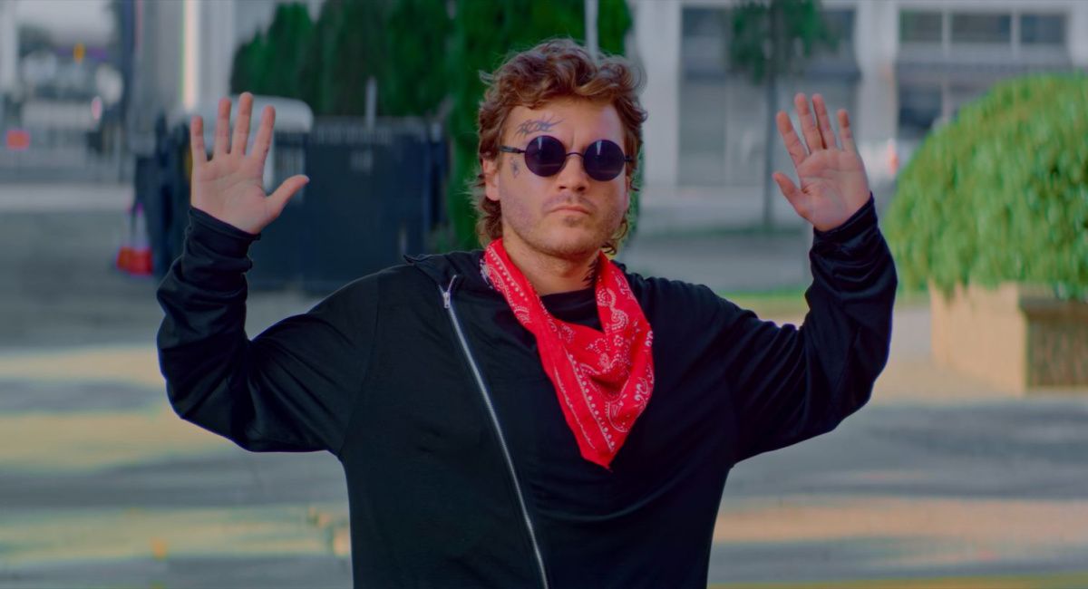 Emile Hirsch with hands up