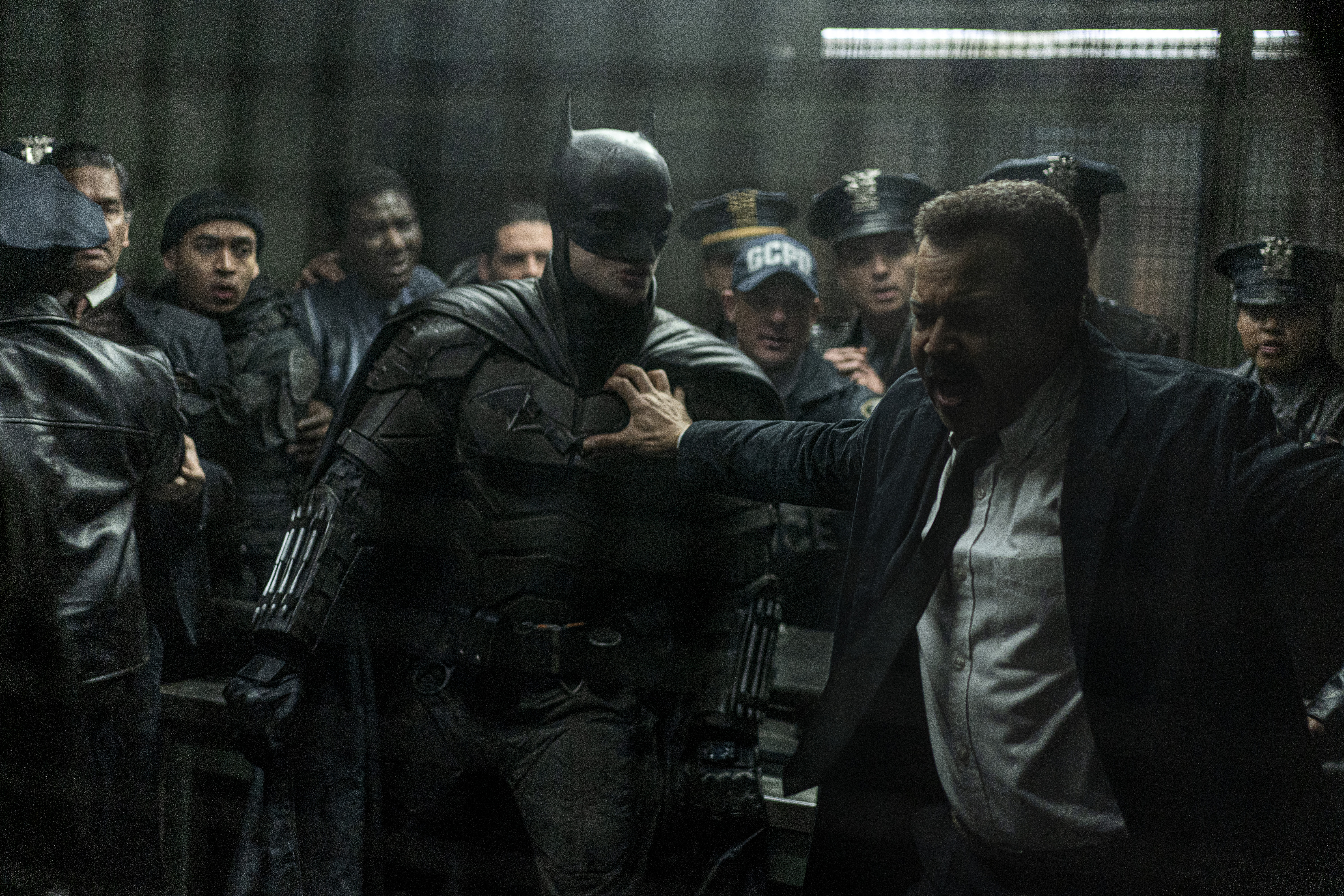 Batman fighting the police