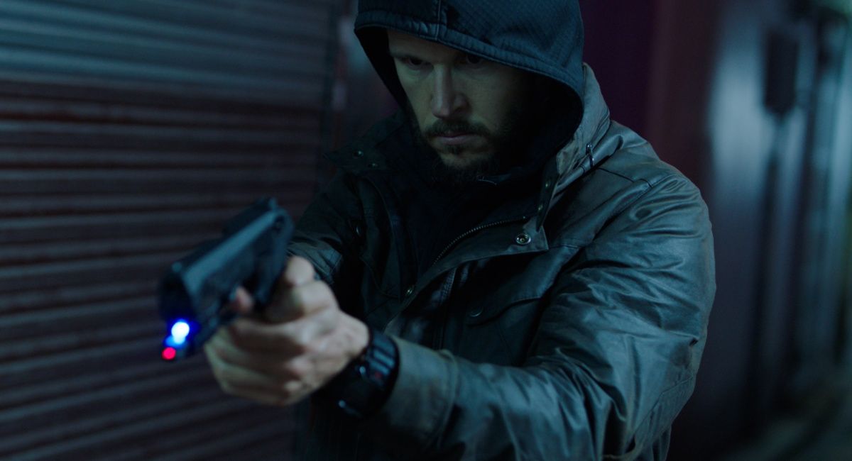 Ryan Kwanten with gun