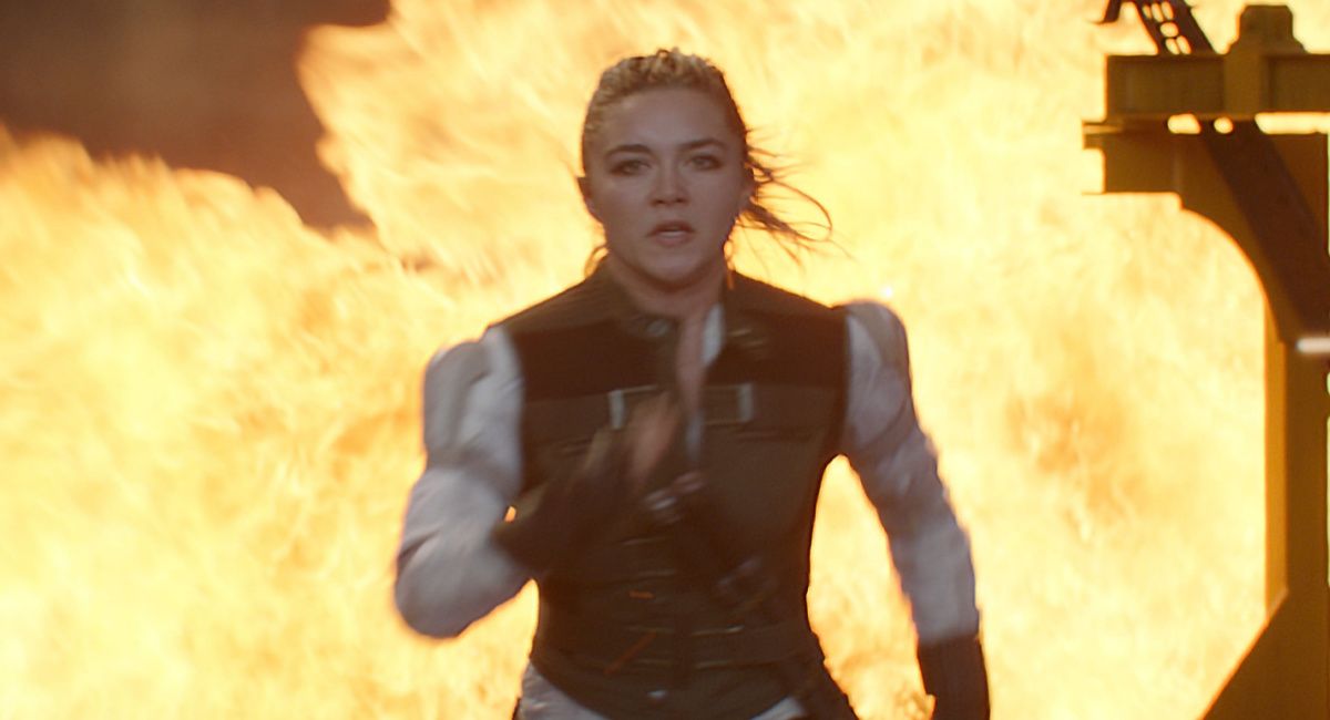 Florence Pugh running in fire