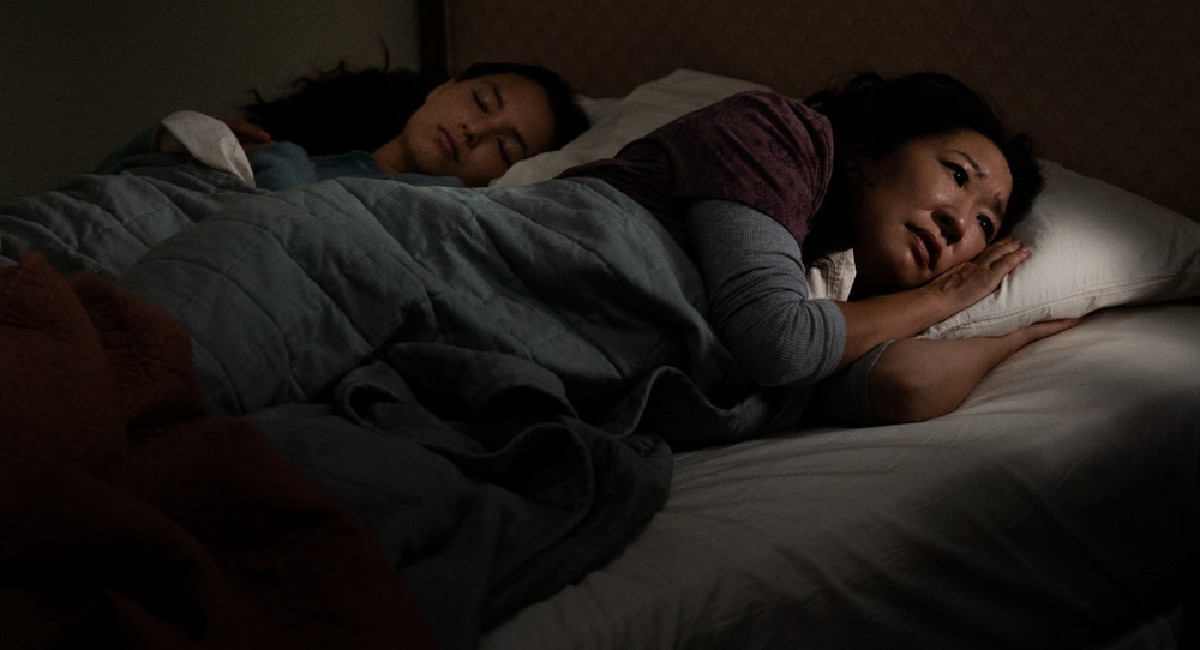 Sandra Oh and Fivel Stewart in bed