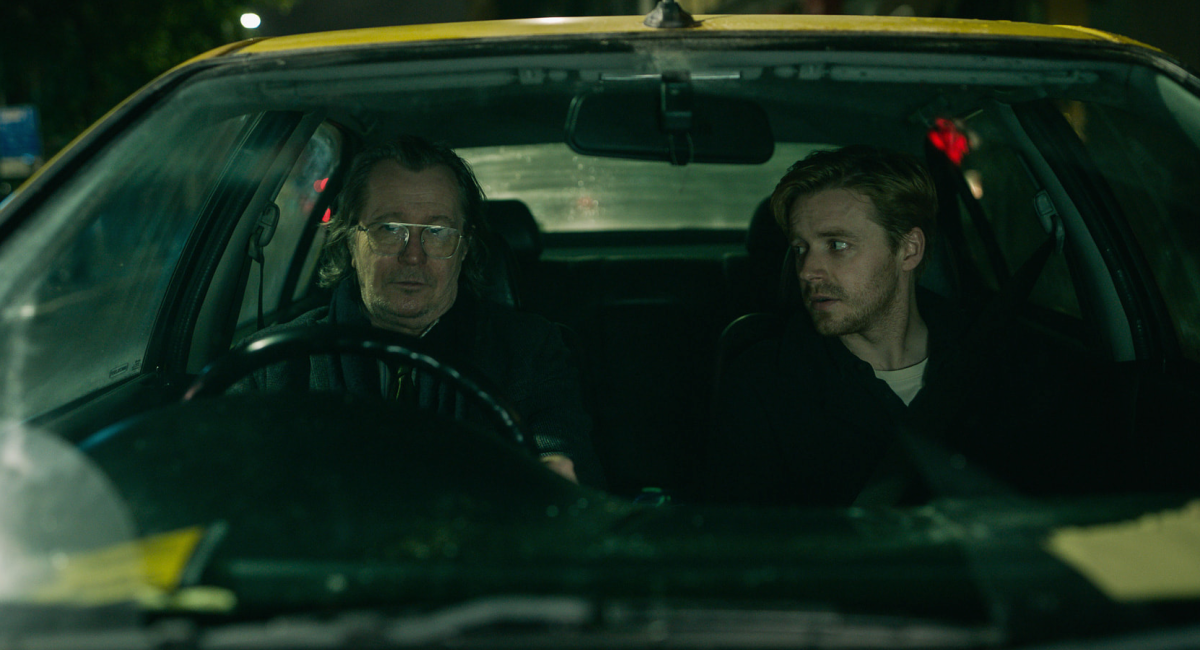 Gary Oldman and Jack Lowden in car
