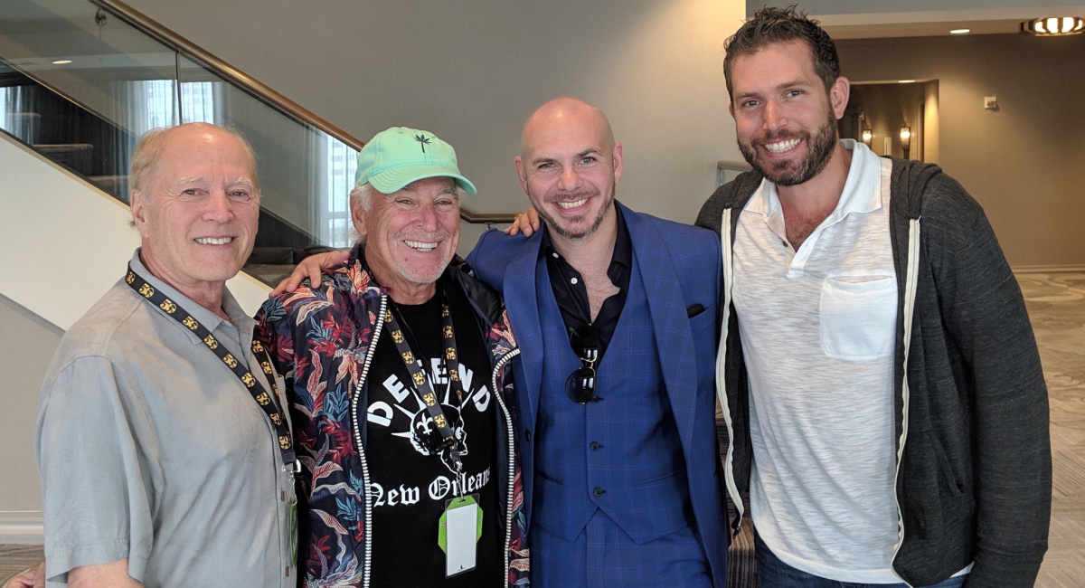 Pitbull, Jimmy Buffet, director Frank Marshall, and director Ryan Suffern from the documentary 'Jazz Fest: A New Orleans Story.'