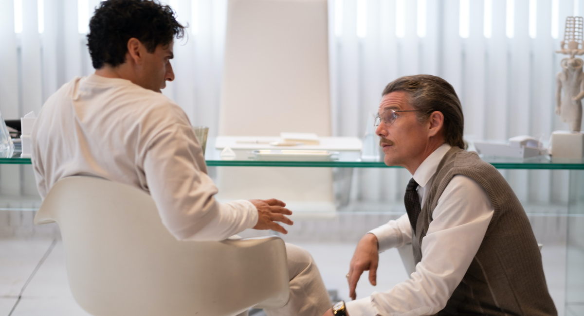 Oscar Isaac as Marc Spector and Ethan Hawke as Arthur Harrow