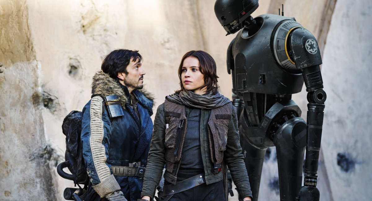 Diego Luna, Felicity Jones and the voice of Alan Tudyk as K-2SO in 'Rogue One: A Star Wars Story.'