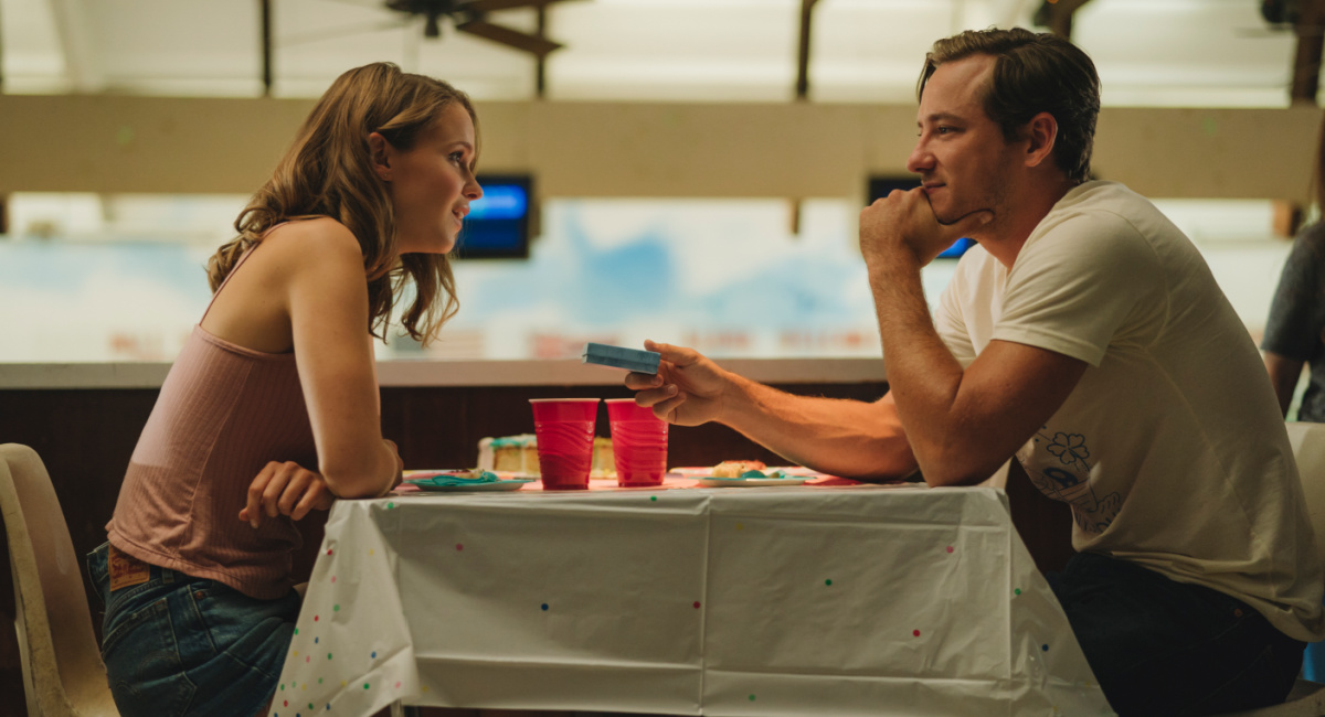 (L to R) Clara Rugaard and Lewis Pullman in ‘Press Play.'