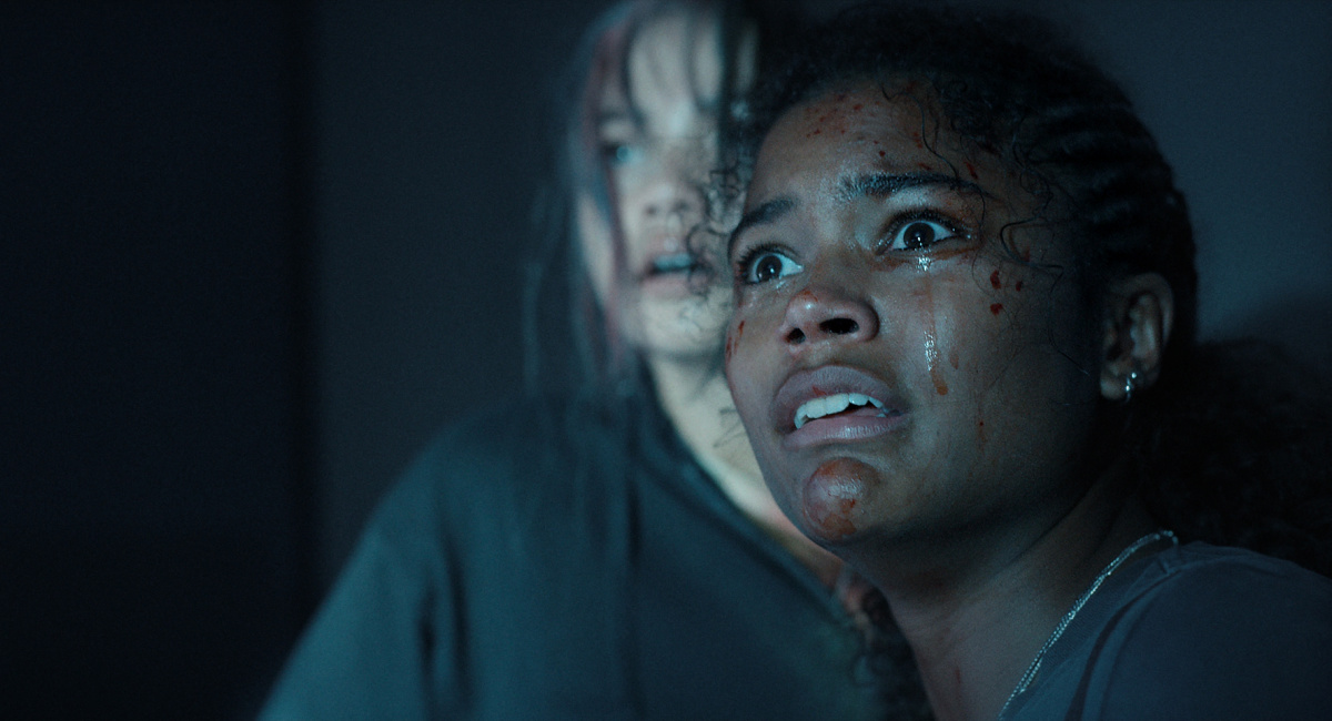 Siena Agudon as young Billie and Tamara Smart as young Jade in 'Resident Evil.'