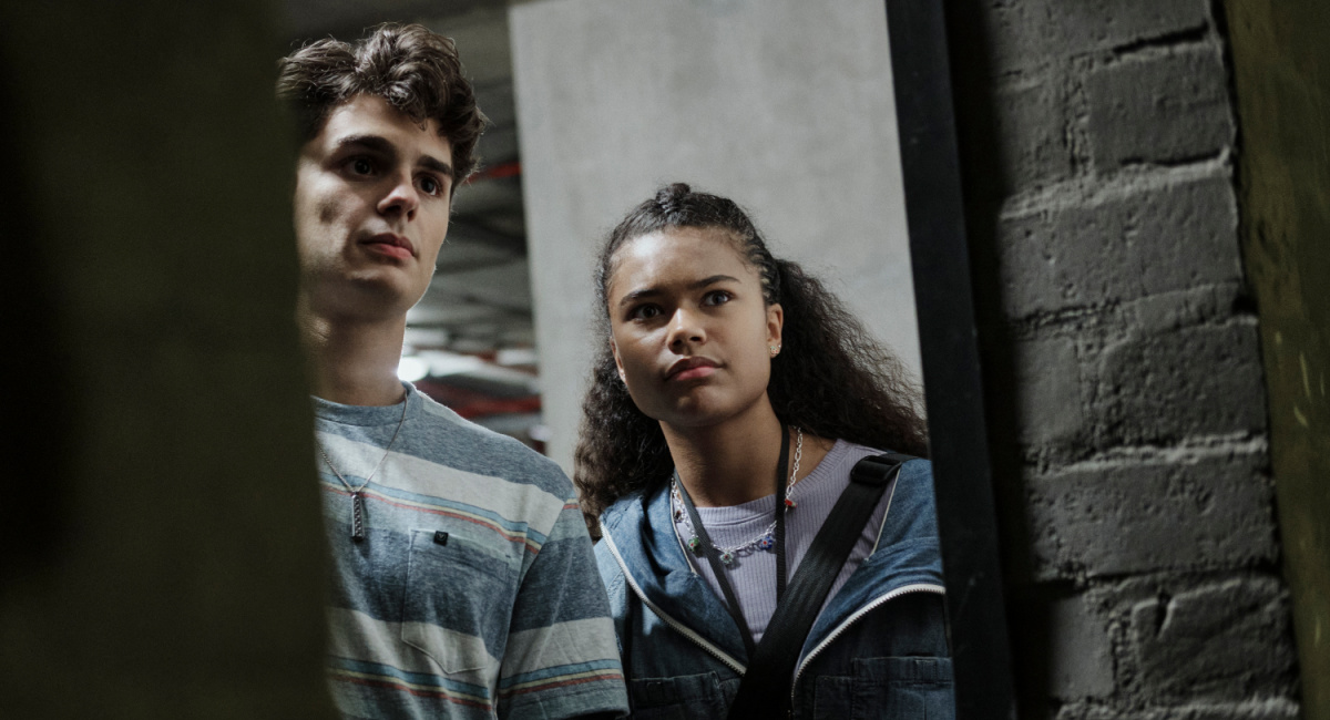 Connor Gossati as Simon and Tamara Smart as young Jade in 'Resident Evil.'