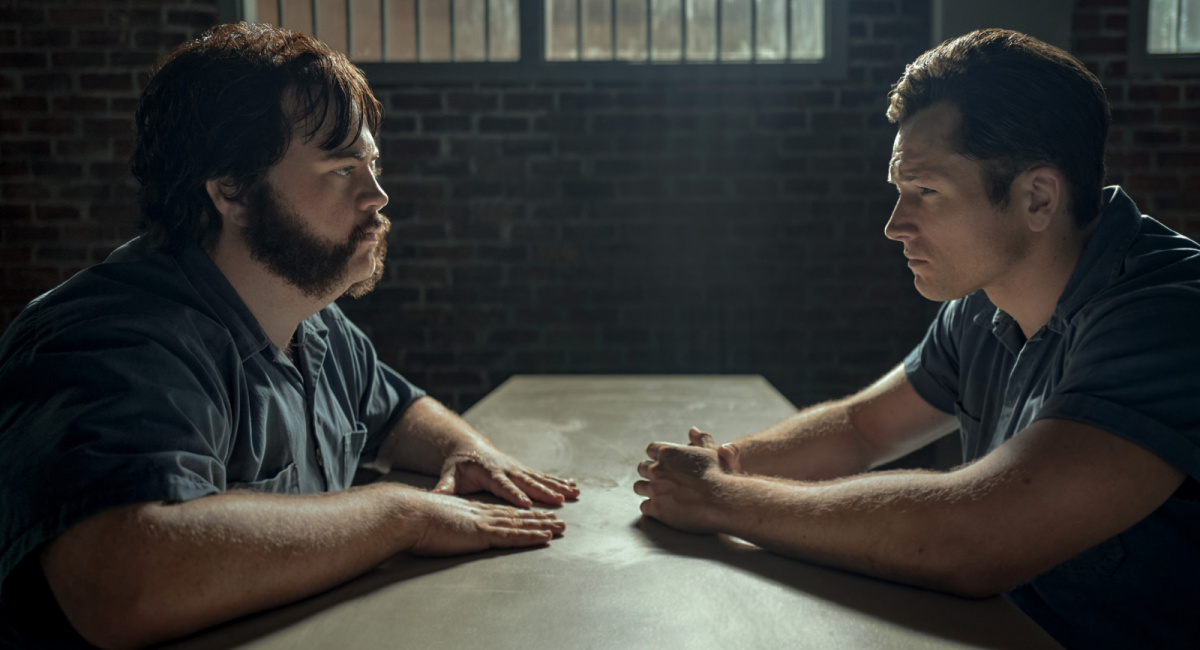 Taron Egerton and Paul Walter Hauser in “Black Bird,” premiering globally July 8, 2022 on Apple TV+.