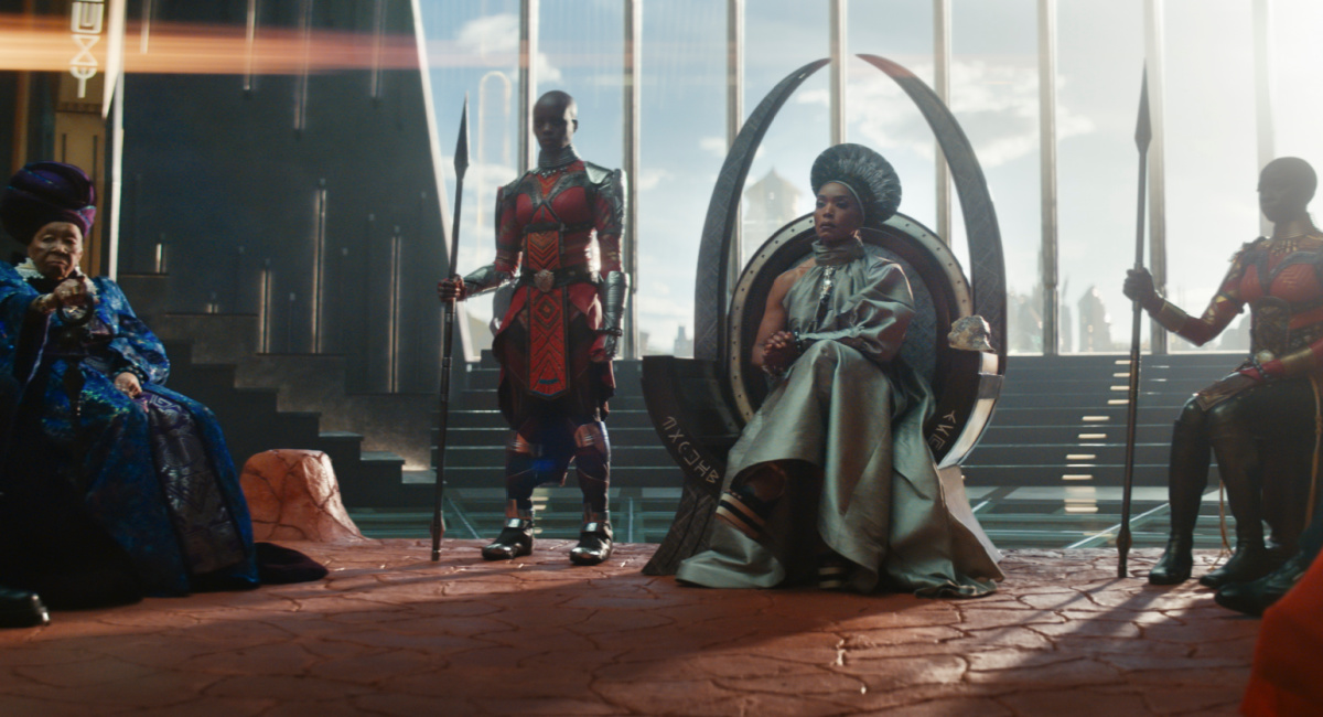Dorothy Steel as Merchant Tribe Elder, Florence Kasumba as Ayo, Angela Bassett as Ramonda, Danai Gurira as Okoye in Marvel Studios 'Black Panther: Wakanda Forever'.