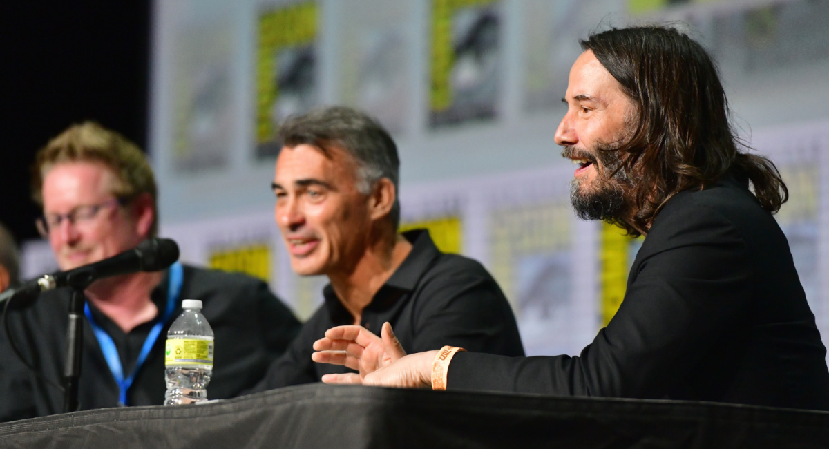 Andrew Stanton, Chad Stahelski, and Keanu Reeves speak onstage at Comic-Con at San Diego Convention Center on July 22, 2022 in San Diego, California. Photo by Jerod Harris/Getty Images for Lionsgate.