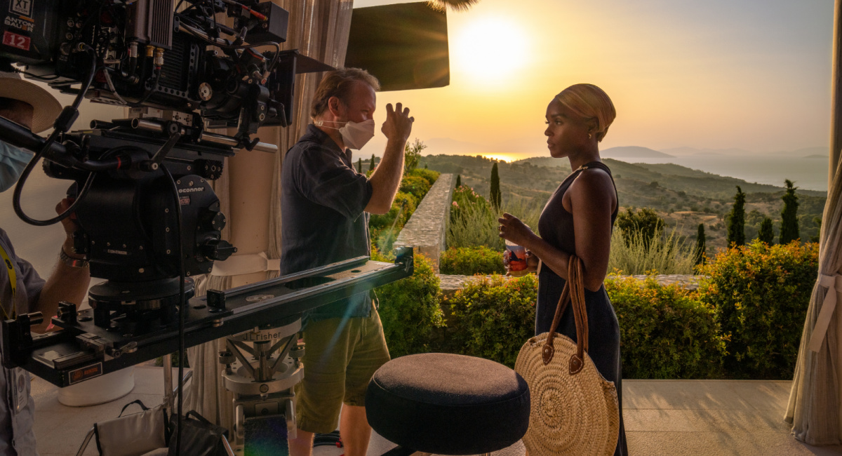Director Rian Johnson and Janelle Monáe on the set of 'Glass Onion: A Knives Out Mystery.'