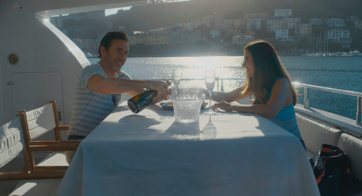 Alessandro Nivola as Nick Martucci and Alison Brie as Amber in 'Spin Me Round.'