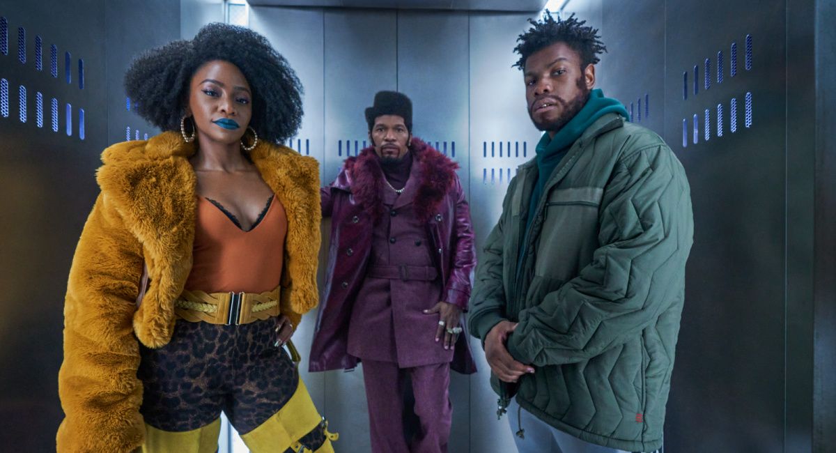 Teyonah Parris as YO-YO, Jamie Foxx (Producer) as Slick Charles, and John Boyega as Fontaine in 'They Cloned Tyrone.'