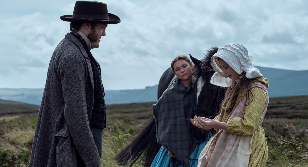 Tom Burke, Florence Pugh, and Kíla Lord Cassidy in Netflix's 'The Wonder.'