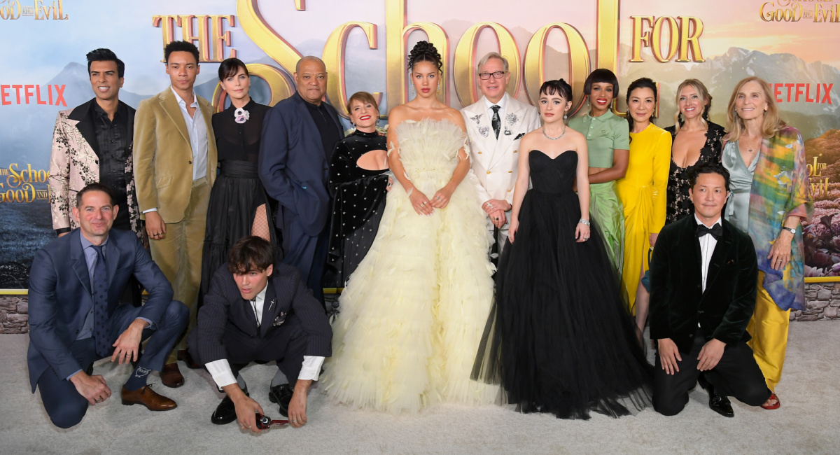 Jeff Kirschenbaum, Soman Chainani, Kit Young, Charlize Theron, Jamie Flatters, Laurence Fishburne, Patti LuPone, Sofia Wylie, Paul Feig, Sophia Anne Caruso, Kerry Washington, Michelle Yeoh, Laura Fischer, Kane Lee, and Jane Startz attend the World Premiere Of Netflix's 'The School For Good And Evil' at Regency Village Theatre on October 18, 2022 in Los Angeles, California.
