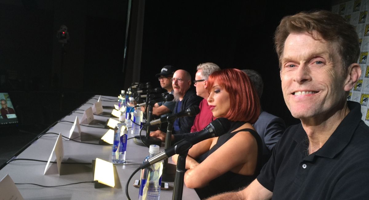 Kevin Conroy (far right) participates in a Comic-Con International panel.