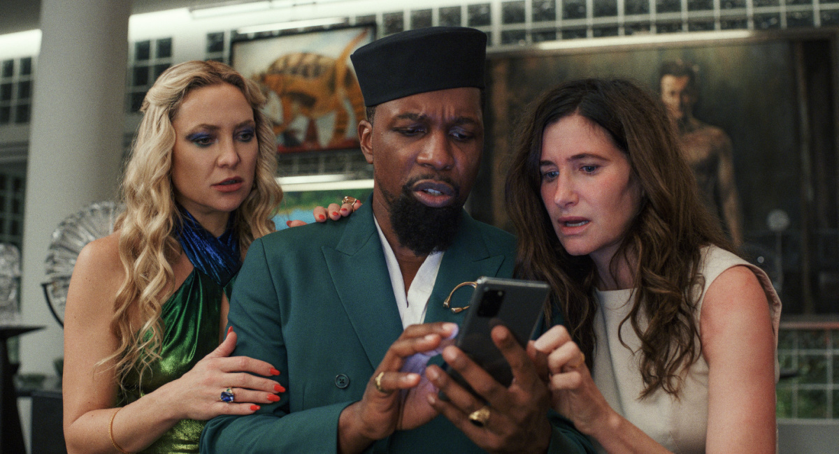 Kate Hudson as Birdie, Leslie Odom Jr. as Lionel and Kathryn Hahn as Claire in 'Glass Onion: A Knives Out Mystery.'