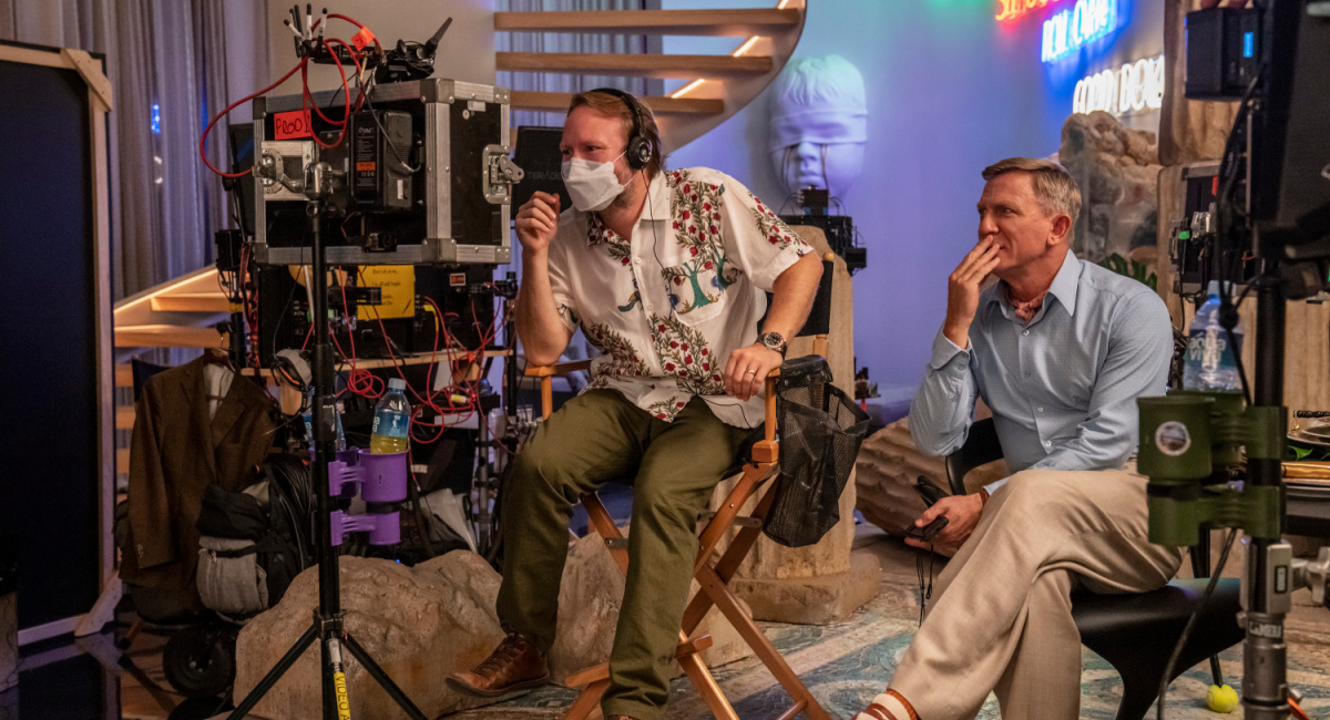 Writer and director Rian Johnson and Daniel Craig on the set of 'Glass Onion: A Knives Out Mystery.'