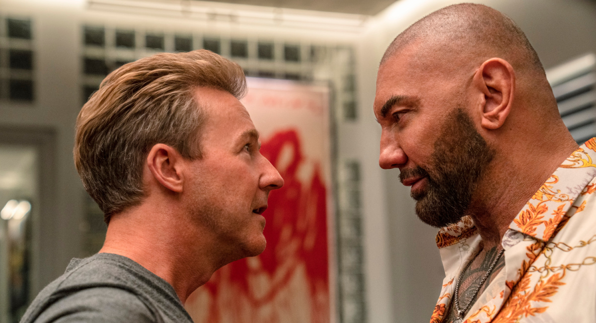 Edward Norton as Miles Bron and Dave Bautista as Duke Cody in 'Glass Onion: A Knives Out Mystery.'