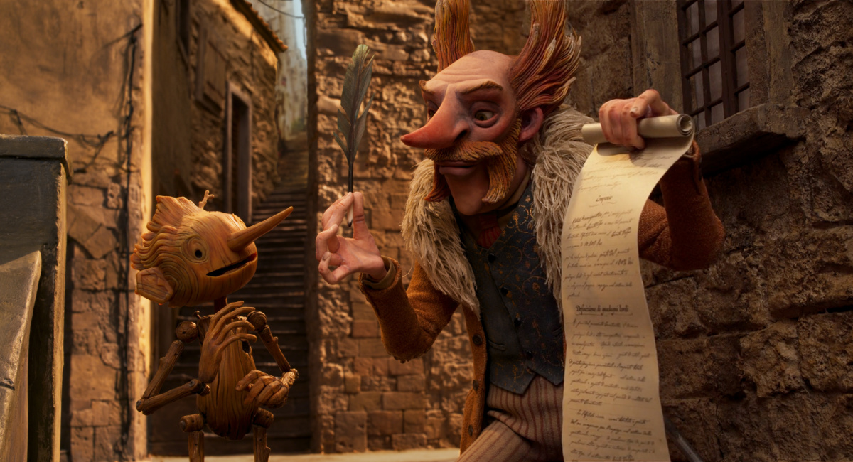 Pinocchio (voiced by Gregory Mann) and Count Volpe (voiced by Christoph Waltz) in Guillermo del Toro's 'Pinocchio.'