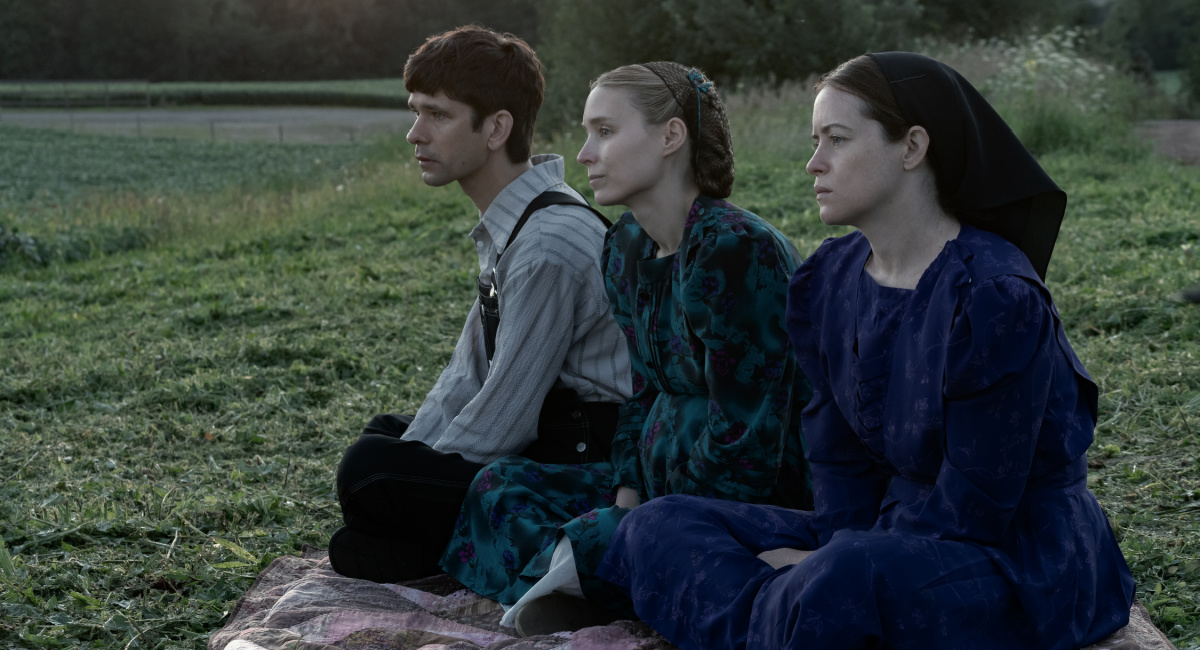 Ben Whishaw stars as August, Rooney Mara as Ona and Claire Foy as Salome in director Sarah Polley’s film 'Women Talking,' an Orion Pictures Release.