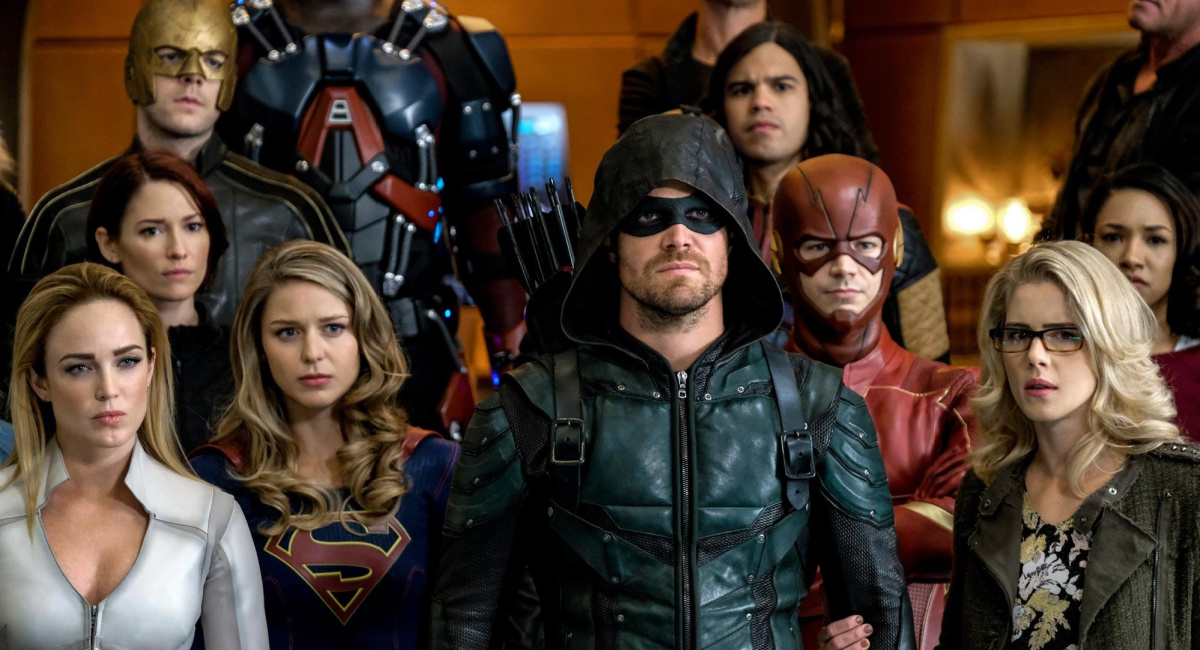 Russell Tovey as The Ray/Ray Terrill,Carlos Valdes as Cisco Ramon/Vibe and Dominic Purcell as Mick Rory/Heat Wave (Middle) Chyler Leigh as Alex Danvers, Grant Gustin as Barry Allen/The Flash and Candice Patton as Iris West (BOTTOM): Caity Lotz as Sara Lance/White Canary, Melissa Benoist as Kara/Supergirl, Stephen Amell as Oliver Queen/Green Arrow and Emily Bett Rickards as Felicity Smoak in the Arrowverse crossover event 'Crisis on Earth-X.'