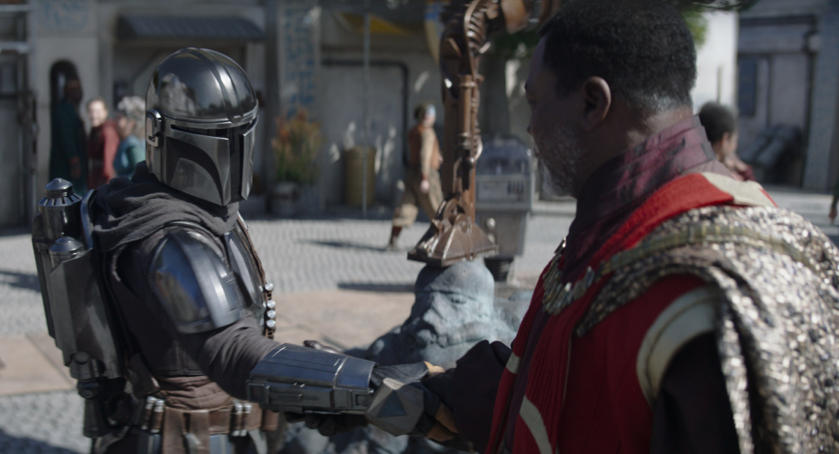 Grogu, Din Djarin (Pedro Pascal) and Greef Karga (Carl Weathers) in Lucasfilm's 'The Mandalorian,' season three, exclusively on Disney+.