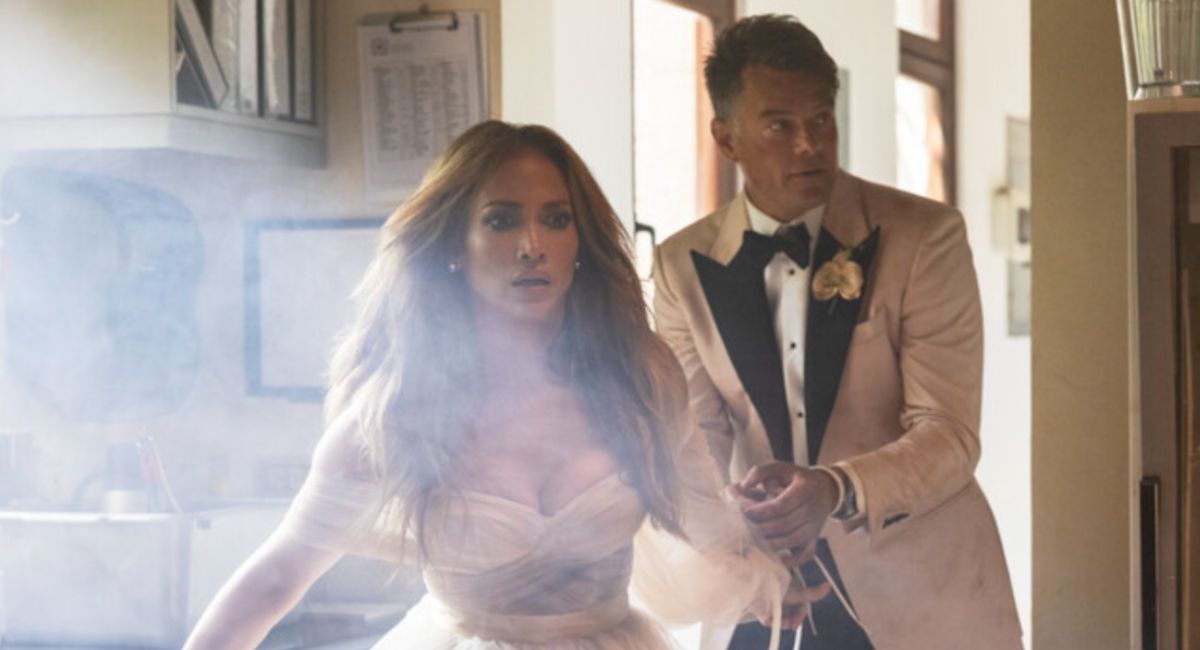 Jennifer Lopez as Darcy Rivera and Josh Duhamel as Tom Fowler in 'Shotgun Wedding.'