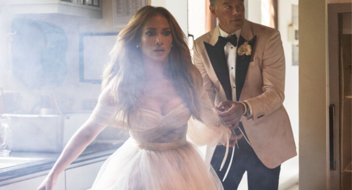 Jennifer Lopez as Darcy Rivera and Josh Duhamel as Tom Fowler in 'Shotgun Wedding.'