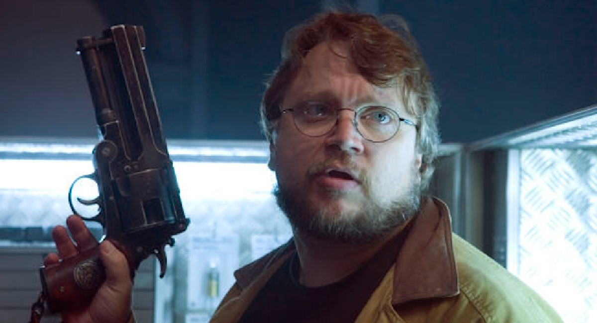 Writer/director Guillermo del Toro holds Hellboy's revolver on the set of 'Hellboy II: The Golden Army.'