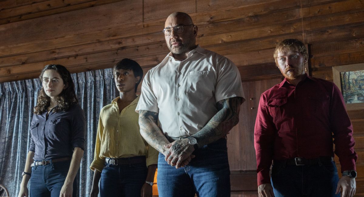 Abby Quinn, Nikki Amuka-Bird, Dave Bautista and Rupert Grint in 'Knock at the Cabin,' directed by M. Night Shyamalan.