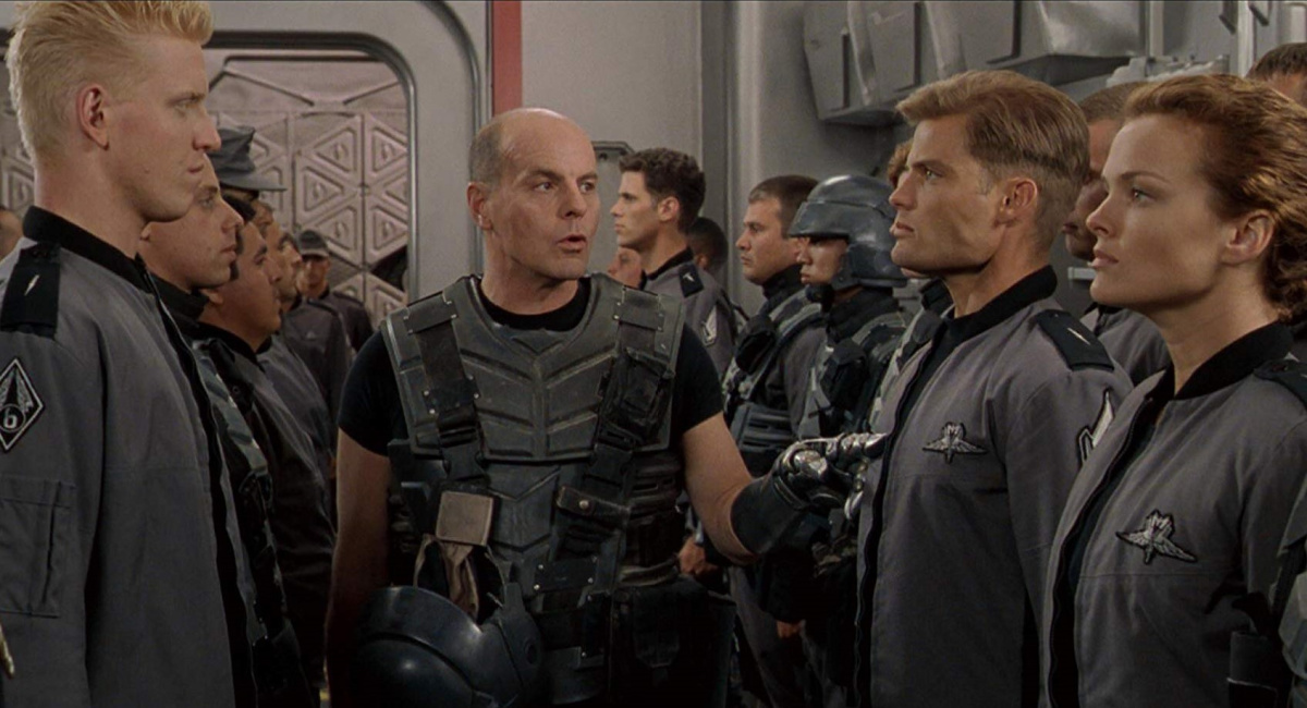 Jake Busey, Michael Ironside, Casper Van Dien, and Dina Meyer in director Paul Verhoeven's 'Starship Troopers.'