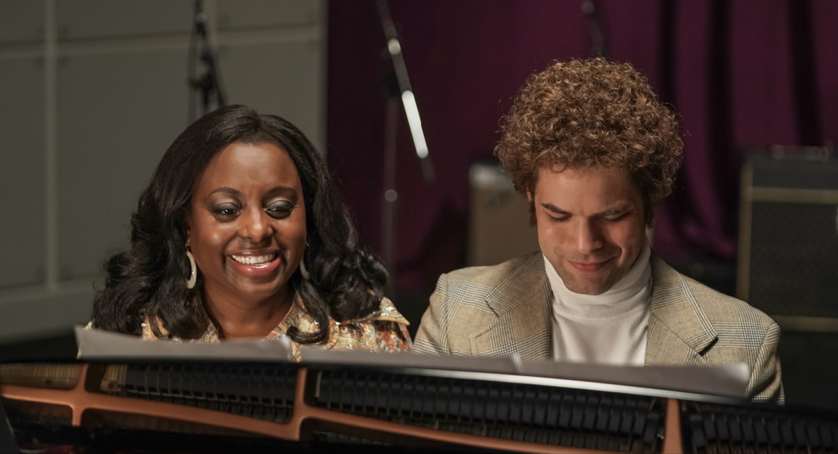 Tayla Parx as Donna Summer and Jeremy Jordan as Neil Bogart in 'Spinning Gold.'
