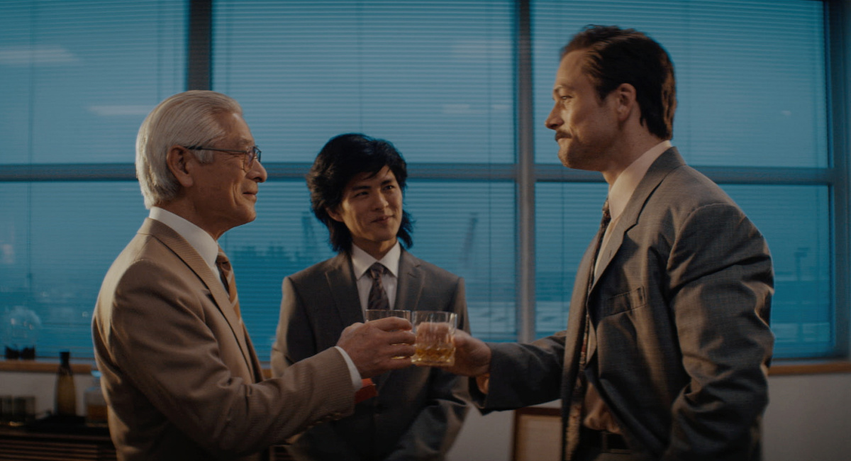 Togo Igawa, Nino Furuhata and Taron Egerton in 'Tetris,' premiering March 31, 2023 on Apple TV+.