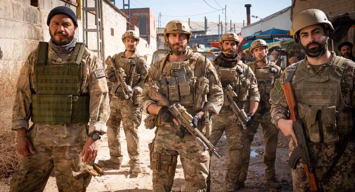 Dar Salim as Ahmed, Jason Wong as Joshua "JJ Jung", Jake Gyllenhaal as Sgt. John Kinley, Christian Ochoa as Eduardo "Chow Chow" Lopez, and Rhys Yates as Tom "Tom Cat" Hancock in 'The Covenant,' directed by Guy Ritchie, a Metro Goldwyn Mayer Pictures film.