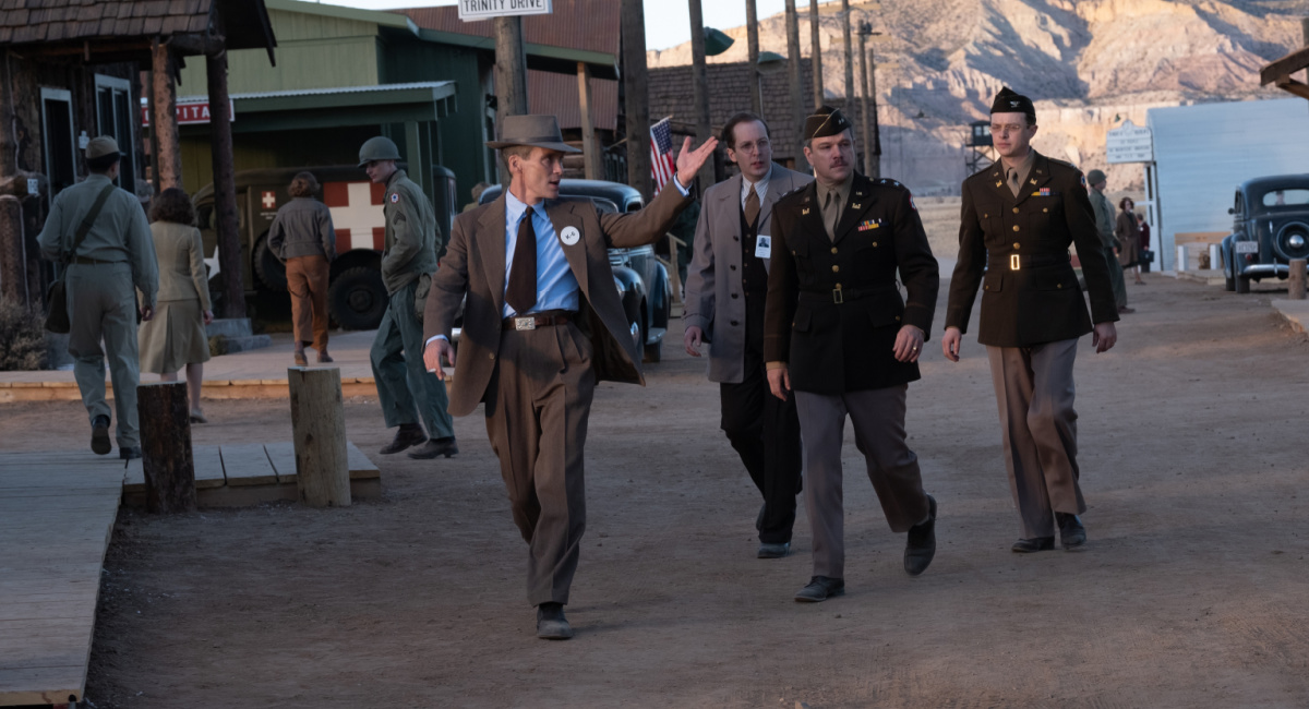 Cillian Murphy is J. Robert Oppenheimer, Olli Haaskivi is Edward Condon, Matt Damon is Leslie Groves, and Dane Dehaan is Kenneth Nichols in 'Oppenheimer,' written, produced, and directed by Christopher Nolan.