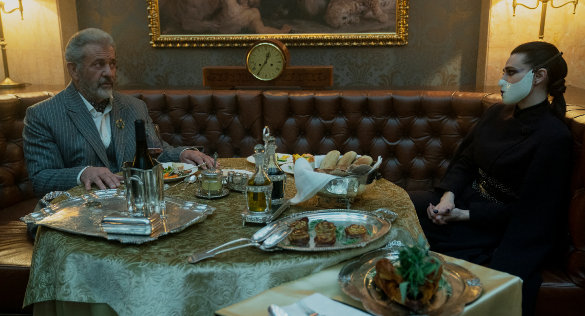 Mel Gibson as Cormac, Katie McGrath as Adjudicator in Peacock's 'The Continental: From the World of John Wick.'