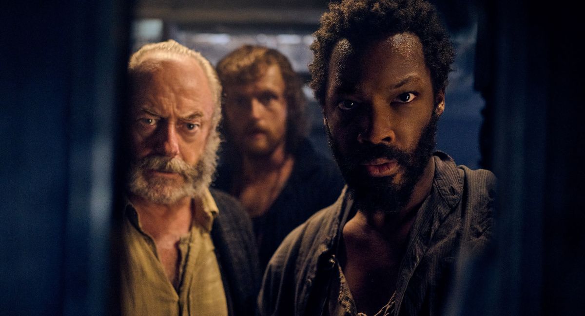 Captain Eliot (Liam Cunningham), Abrams (Chris Walley) and Clemens (Corey Hawkins) in 'The Last Voyage of the Demeter,' directed by André Øvredal. P