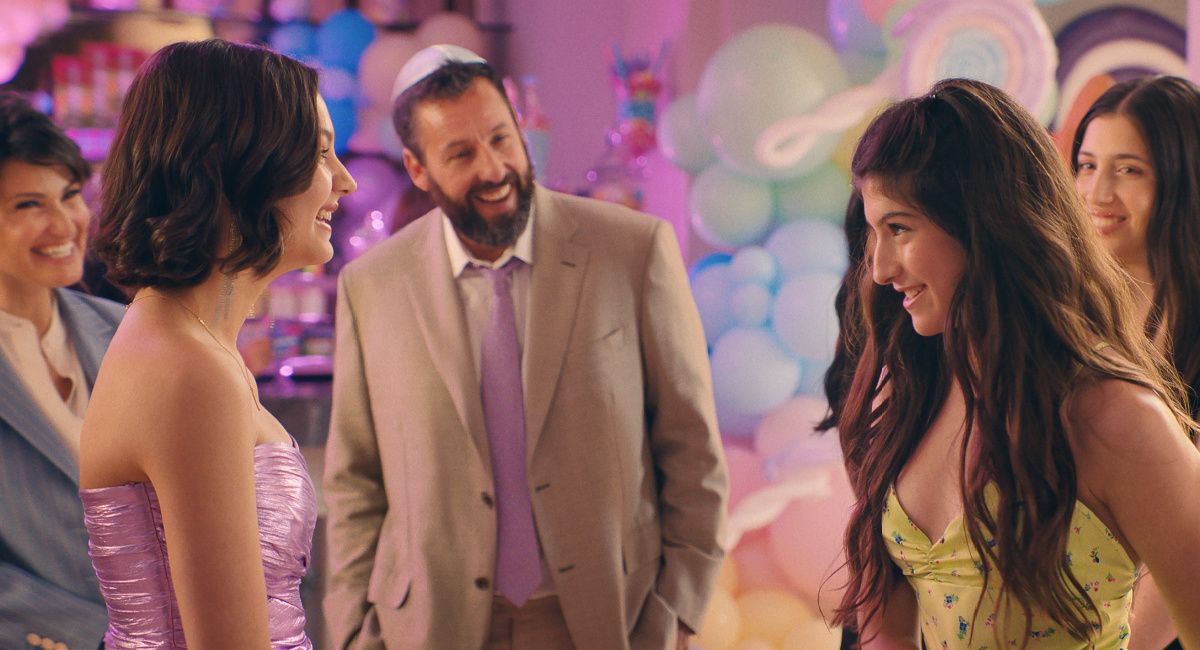 Idina Menzel as Bree Friedman, Samantha Lorraine as Lydia Rodriguez Katz, Adam Sandler as Danny Friedman, Sunny Sandler as Stacy Friedman and Sadie Sandler as Ronnie Friedman in 'You Are So Not Invited To My Bat Mitzvah.'