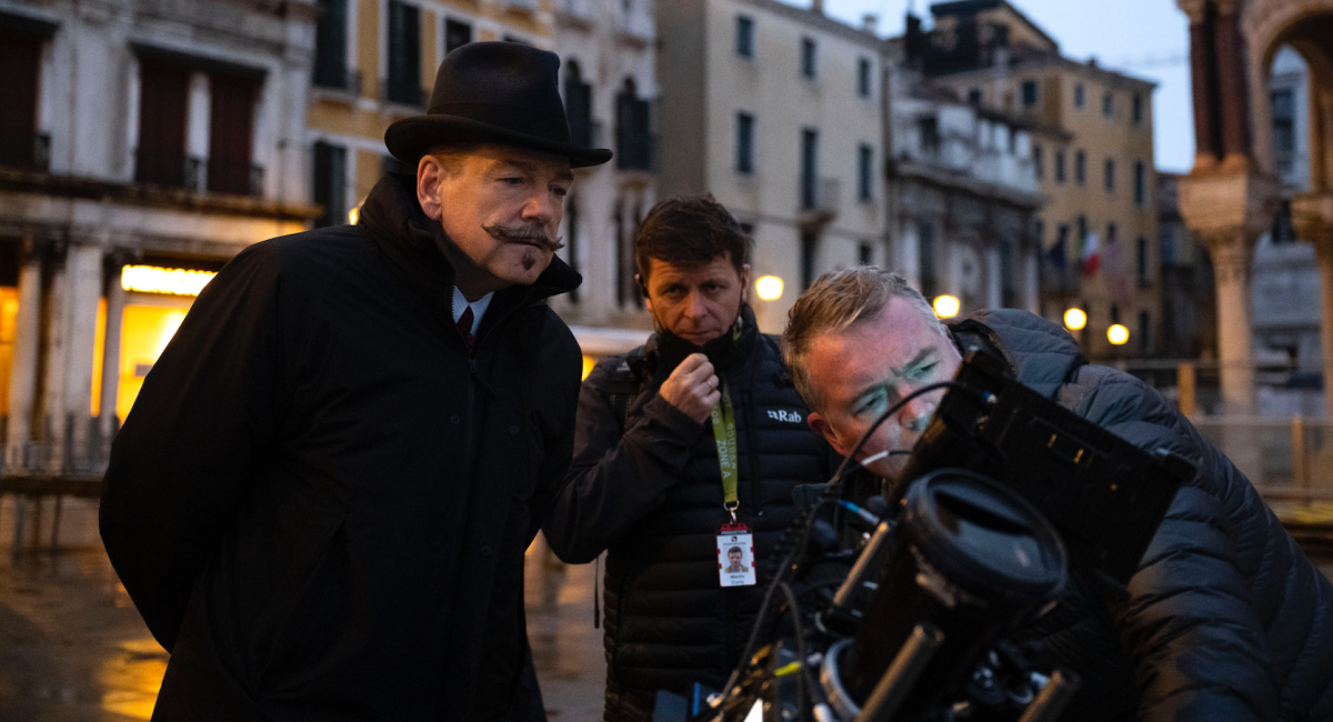 Director Kenneth Branagh as Hercule Poirot and crew on the set of 20th Century Studios' 'A Haunting In Venice.'