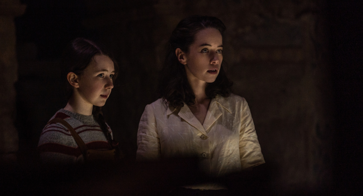 Katelyn Rose Downey as Sophie and Anna Popplewell as Kate in New Line Cinema's horror thriller 'The Nun II,' a Warner Bros. Pictures release.