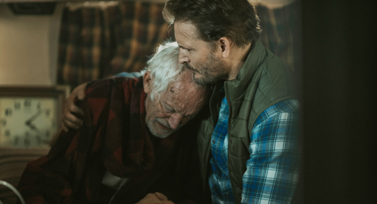 Lance Henriksen as “George Laughlin” and Peter Facinelli as “Dave Laughlin” in the survival drama/thriller, 'On Fire,' a Cineverse release.