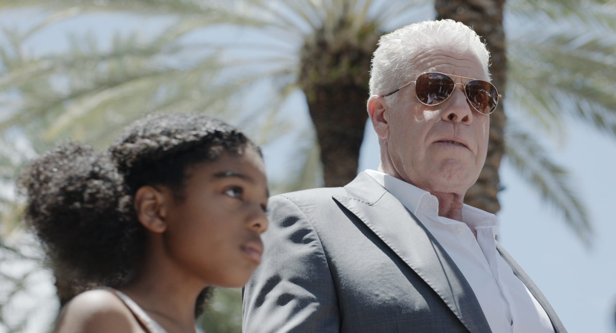 Thalia Campbell as Sarah and Ron Perlman as Bobo in 'The Retirement Plan.'