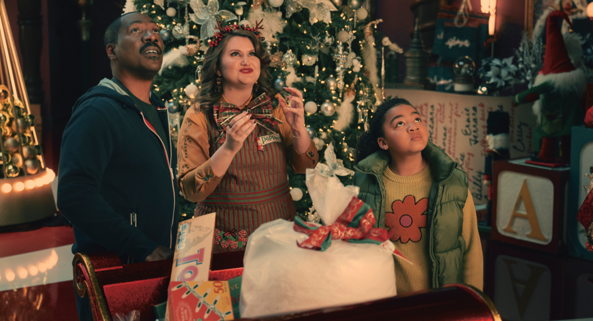 Eddie Murphy as Chris Carver, Jillian Bell as Pepper, and Madison Thomas as Holly Carver star in 'Candy Cane Lane.'