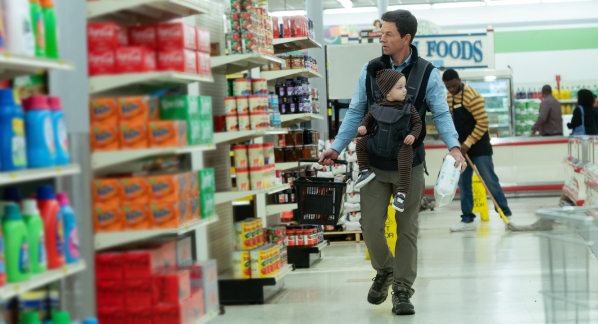Mark Wahlberg and Iliana Norris in 'The Family Plan,' premiering December 15, 2023 on Apple TV+.