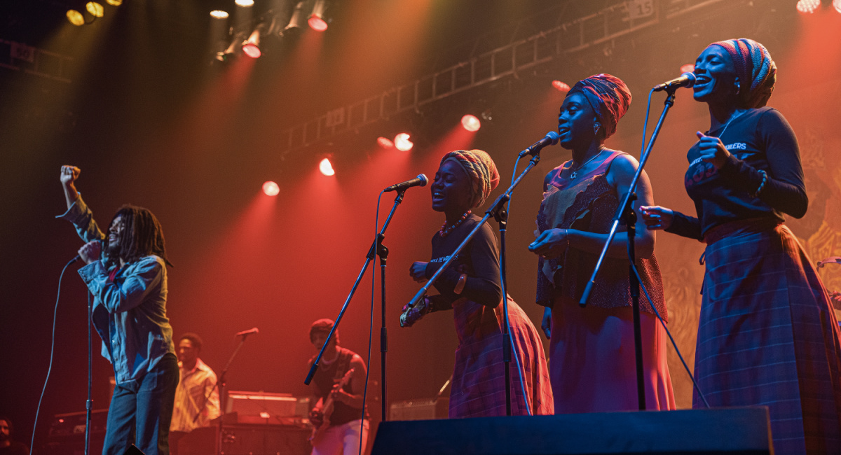 Kingsley Ben-Adir as “Bob Marley”, Anna-Sharé Blake as “Judy Mowatt”, Lashana Lynch as “Rita Marley”, and Naomi Cowan as “Marcia Griffiths” in 'Bob Marley: One Love' from Paramount Pictures.